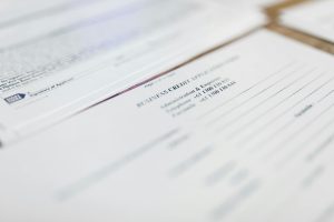 Focused image of business credit application papers, ideal for finance themes.